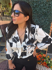 Blusa pico flor